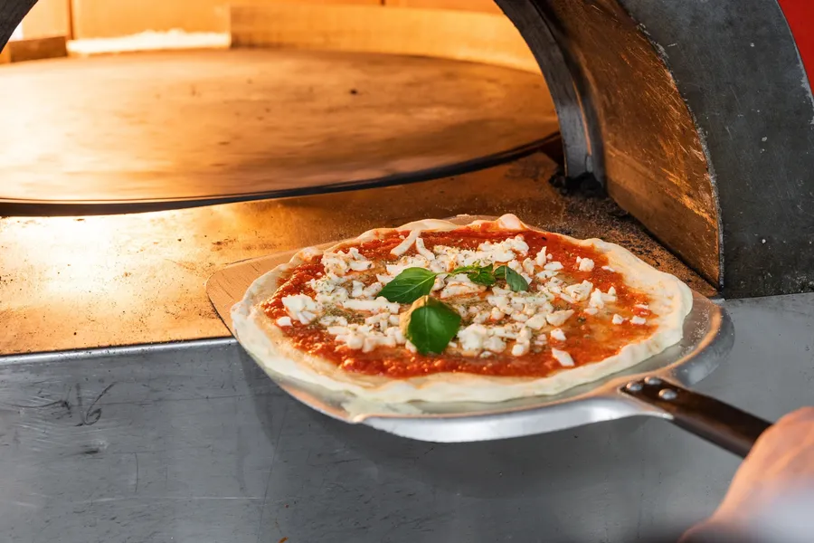 Impliquez votre équipe et cuisinez votre pizza avec Renzo - Image n°1 - Wecandoo