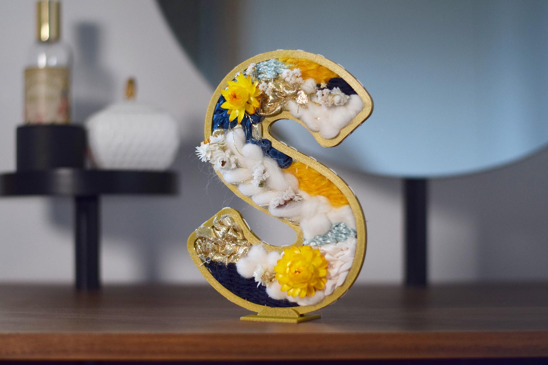 Créez votre lettre tissée et fleurie