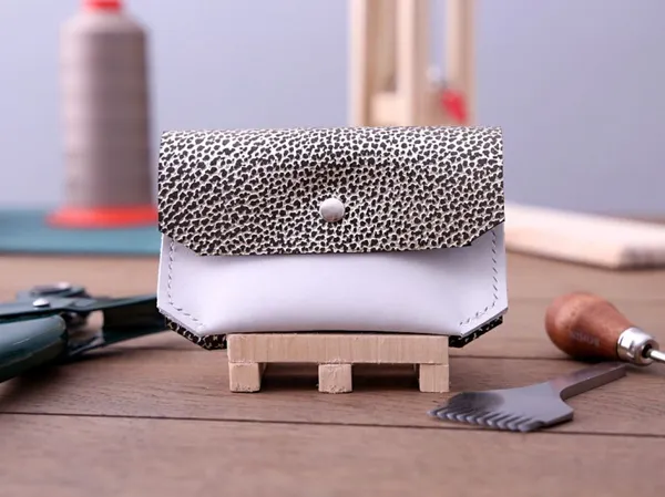 Wecandoo - Réalisez votre portefeuille en couture point sellier